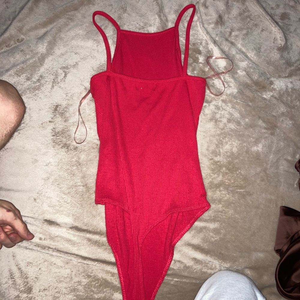 red bodysuit from dress up boutique size small